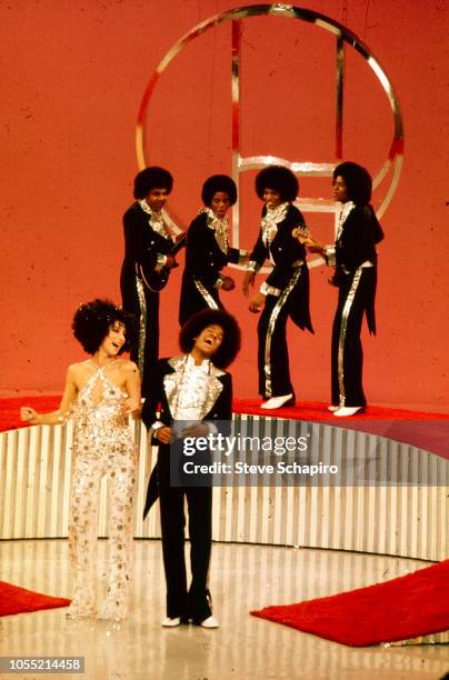 American singers Cher and Michael Jackson , along with members of the Jackson 5, perform on an episode of the former's television variety show...