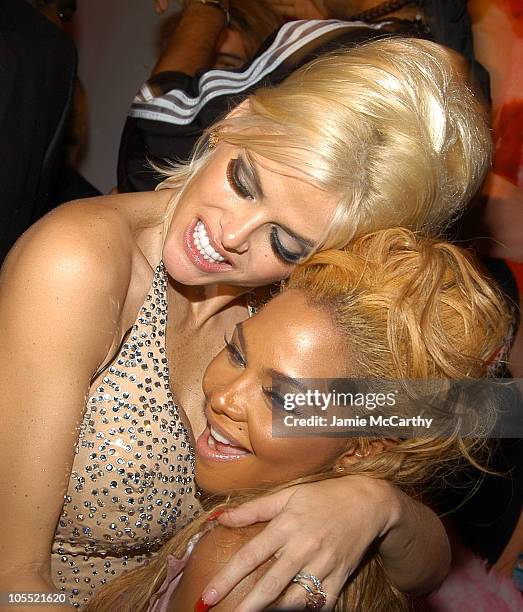 Anna Nicole Smith and Lil' Kim during Olympus Fashion Week Spring 2005 - Mao Magazine Launch Party at Altman Building in New York City, New York,...