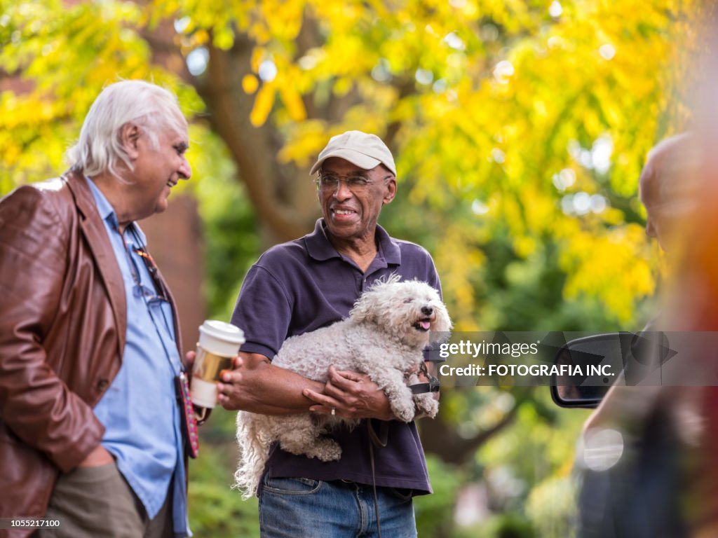 Seniors friendly talk in the neighborhood