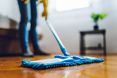Young woman cleaning house