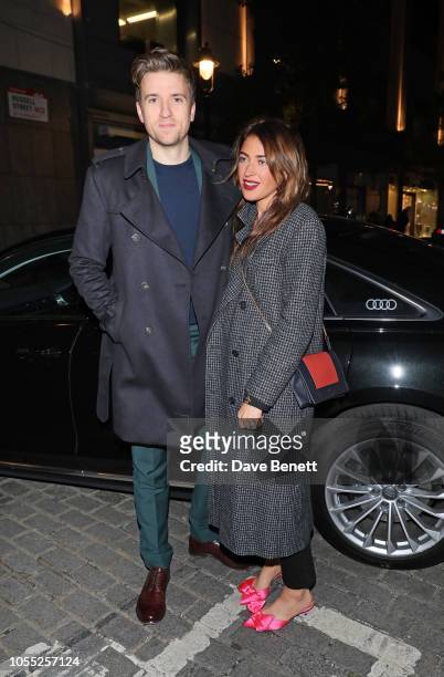Greg James and Bella Mackie arrive in an Audi at British GQ's 30 Years Anniversary Celebration at SUSHISAMBA on October 29, 2018 in London, Englan