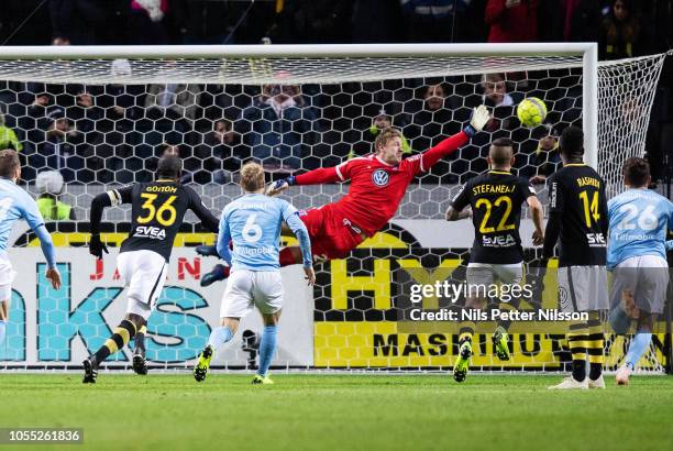 Sebastian Larsson of AIK scores the decisive goal to 1-1 in the 96th minute during the Allsvenskan match between AIK and Malmo FF at Friends Arena on...