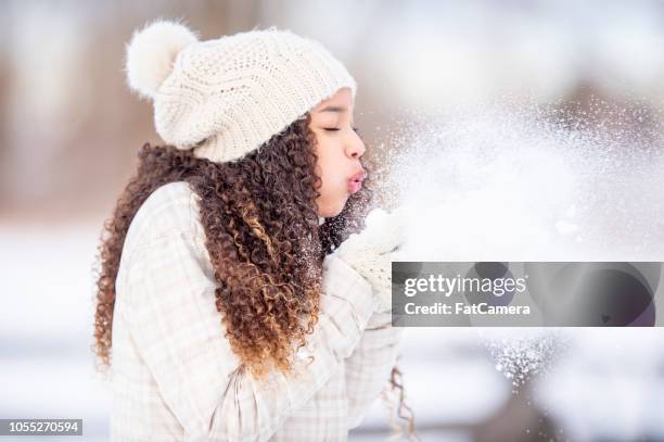 teenage girl having fun in the snow - jan 19 stock pictures, royalty-free photos & images