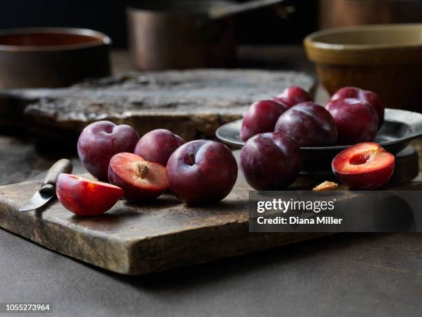 fresh plums - plum stock pictures, royalty-free photos & images