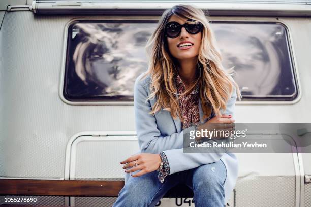 woman posing near trailer - trailer home stock pictures, royalty-free photos & images