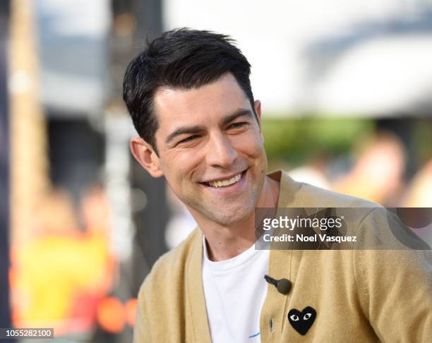 Max Greenfield visits "Extra" at Universal Studios Hollywood on October 29, 2018 in Universal City, California.
