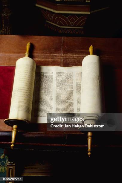 torah rolls in synagogue - judaism stock pictures, royalty-free photos & images