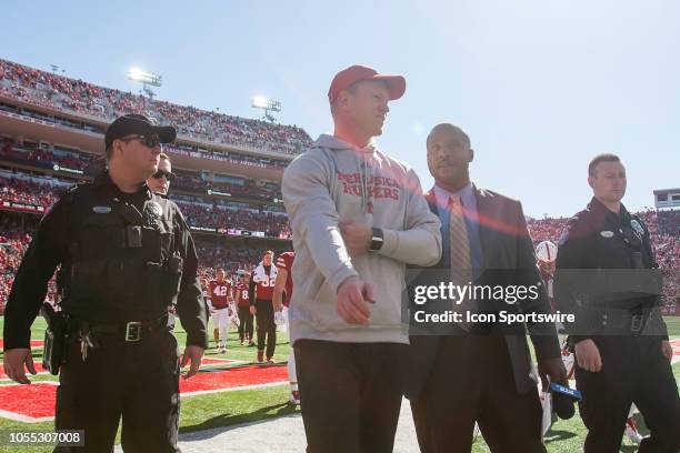 Nebraska Cornhuskers head coach Scott Frost walks back to the locker room at halftime during the game between the Bethune-Cookman Wildcats and the...