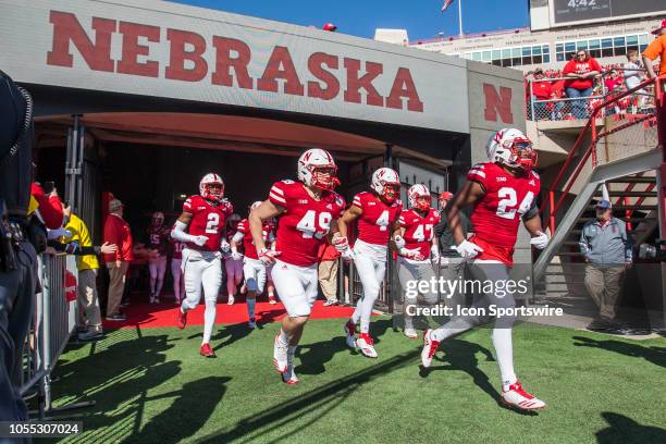 Members of the Corn Husker Football team take the field after halftime during the game between the Bethune-Cookman Wildcats and the Nebraska...