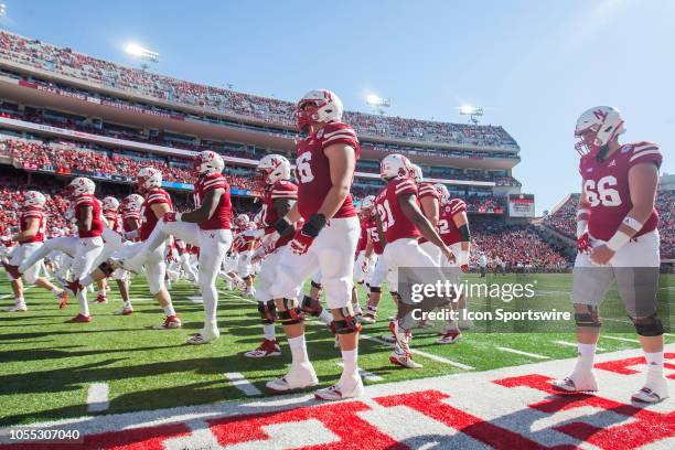 Members of the Corn Husker Football team take the field after halftime during the game between the Bethune-Cookman Wildcats and the Nebraska...