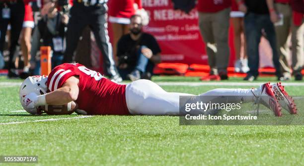 Nebraska Cornhuskers tight end Jack Stoll lays on the ground after nearly scoring a touchdown during the game between the Bethune-Cookman Wildcats...