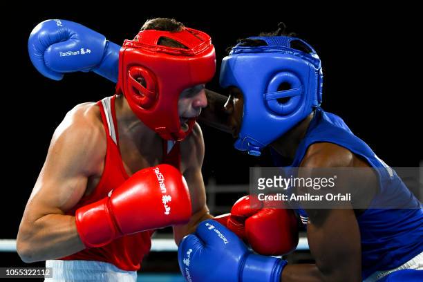 Ilia Popov of Russia and Otha Jones of United States compete in the Men's Light Welter Preliminary Round 2 on day 9 of Buenos Aires 2018 Youth...