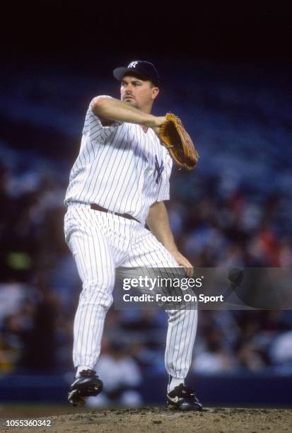 David Wells of the New York Yankees pitches during an Major League Baseball game circa 1997 at Yankee Stadium in the Bronx borough of New York City....