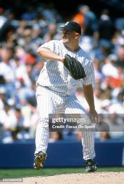 David Wells of the New York Yankees pitches during an Major League Baseball game circa 1997 at Yankee Stadium in the Bronx borough of New York City....