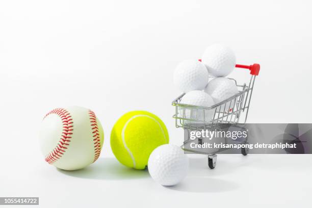 sports equipment with shopping cart - tennis ball icon stock pictures, royalty-free photos & images