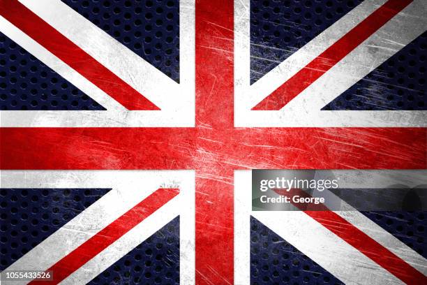 flag of england on a stainless steel surface - union jack stockfoto's en -beelden