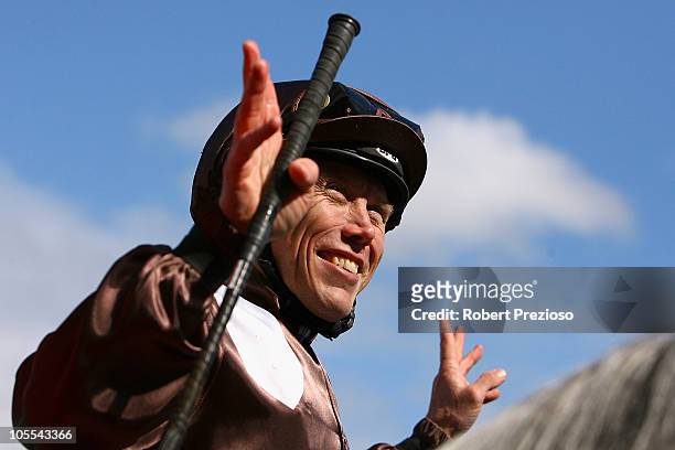 Chris Munce riding Descarado wins race Eight BMW Caulfield Cup during Caulfield Cup Day at Caulfield Racecourse on October 16, 2010 in Melbourne,...