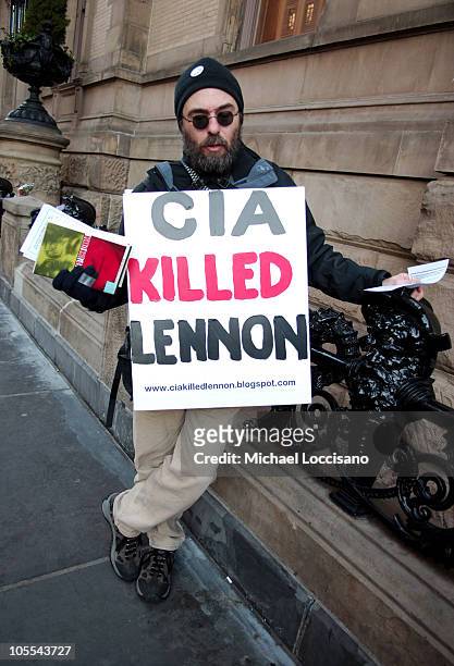 Atmosphere during 25th Anniversary of John Lennon's Death Remembered in New York City at The Dakota Building and Strawberry Fields - Central Park in...