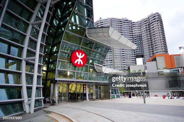 exit h of the guangzhou-shenzhen-hong kong express rail link's west kowloon terminus 3 - first day of service of the guangzhou shenzhen hong kong express rail link train stock pictures, royalty-free photos & images