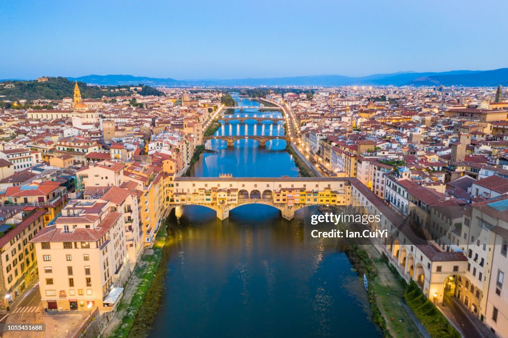 Ponte Vecchio bridge and the historic city of Florence at dusk. (Dusk)