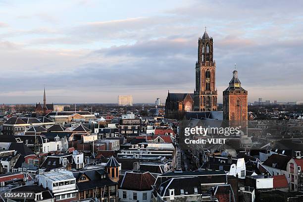 skyline view of utrecht in the netherlands - utrecht stockfoto's en -beelden