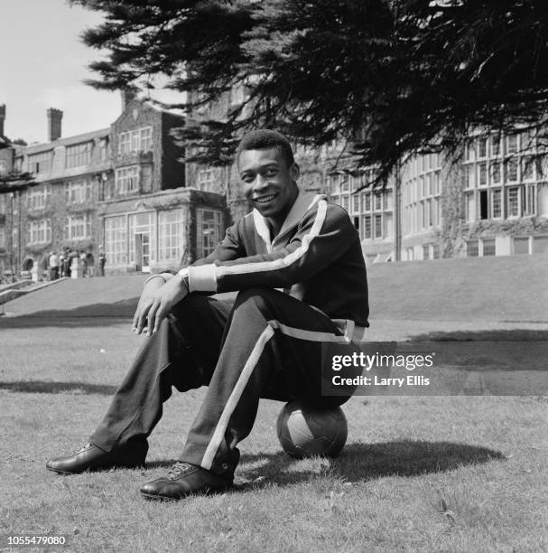 Brazilian professional footballer Pele pictured in the grounds of a Surrey hotel the day before the Brazil national team's International Friendly...