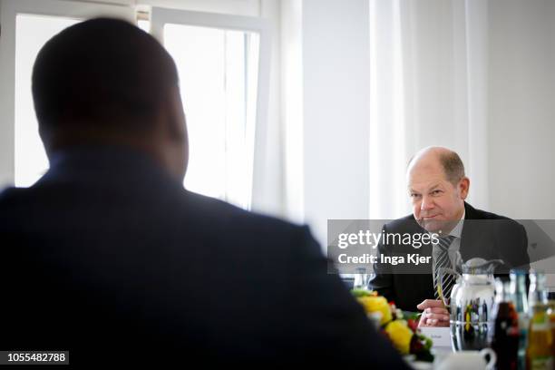 Berlin, Germany German Finance Minister Olaf Scholz meets Faure Essozimna Gnassingbe, President of Togo, on October 30, 2018 in Berlin, Germany.