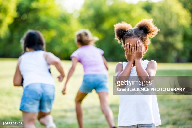 girls playing hide and seek - hide and seek stock pictures, royalty-free photos & images