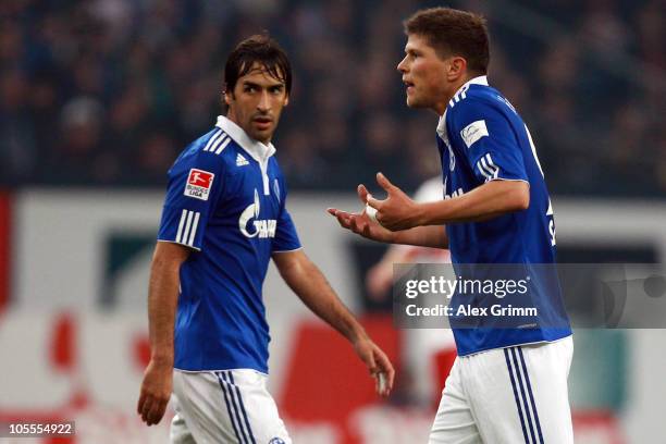 Klaas-Jan Huntelaar and Raul Gonzalez of Schalke react during the Bundesliga match between FC Schalke 04 and VfB Stuttgart at the Veltins Arena on...