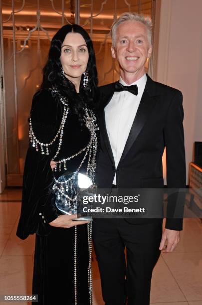 Susie Cave and Philip Treacy attend the Harper's Bazaar Women Of The Year Awards 2018, in partnership with Michael Kors and Mercedes-Benz, at...