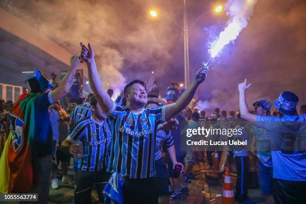 Gremio fans cheer for their team before the match between Gremio and River Plate as part of Copa Conmebol Libertadores 2018 at Arena do Gremio on...