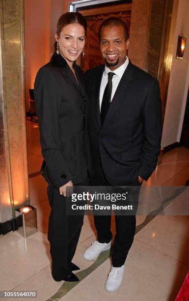 Cameron Russell and Damani Baker attend the Harper's Bazaar Women Of The Year Awards 2018, in partnership with Michael Kors and Mercedes-Benz, at...