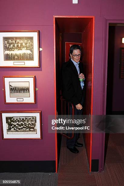 In this handout image supplied by Liverpool Football Club, John W Henry of NESV enters the Liverpool Museum through an old turnstile on October 16,...