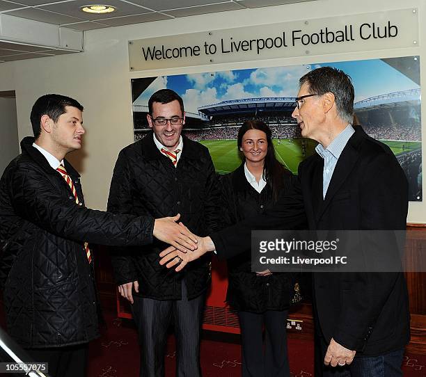 In this handout image supplied by Liverpool Football Club, John W Henry of NESV meets theLiverpool Museum tour staff on October 16, 2010 in...