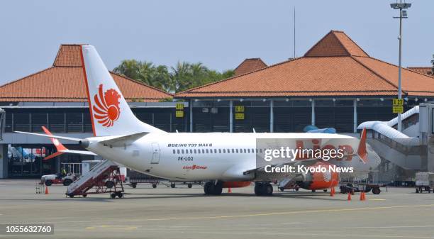 Photo taken Oct 29 shows a Lion Air passenger jet of the Boeing 737 MAX 8 series at Jakarta Airport. The same type of aircraft belonging to the...