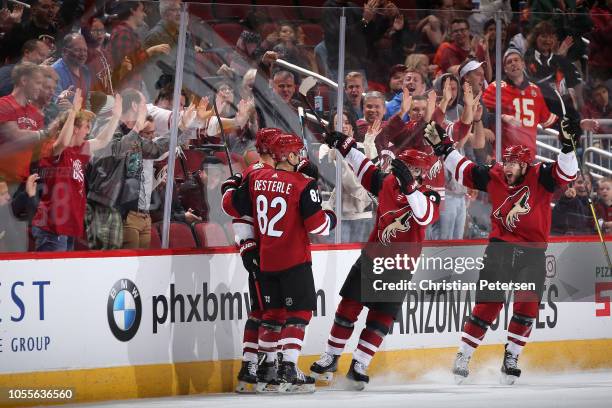 Richard Panik, Jordan Oesterle, Clayton Keller and Alex Galchenyuk of the Arizona Coyotes celebrate after Panik scored a goal against the Ottawa...