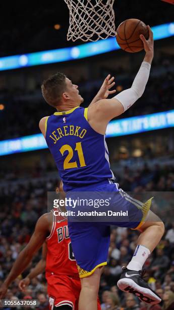 Jonas Jerebko of the Golden State Warriors lays in a shot against the Chicago Bulls at the United Center on October 29, 2018 in Chicago, Illinois....