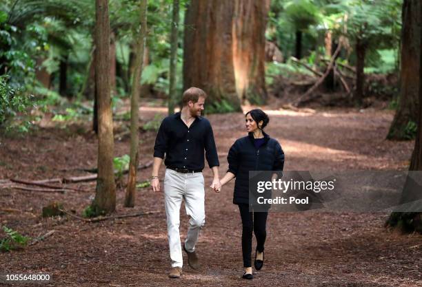 Prince Harry, Duke of Sussex and Meghan, Duchess of Sussex visit Redwoods Tree Walk on October 31, 2018 in Rotorua, New Zealand. The Duke and Duchess...
