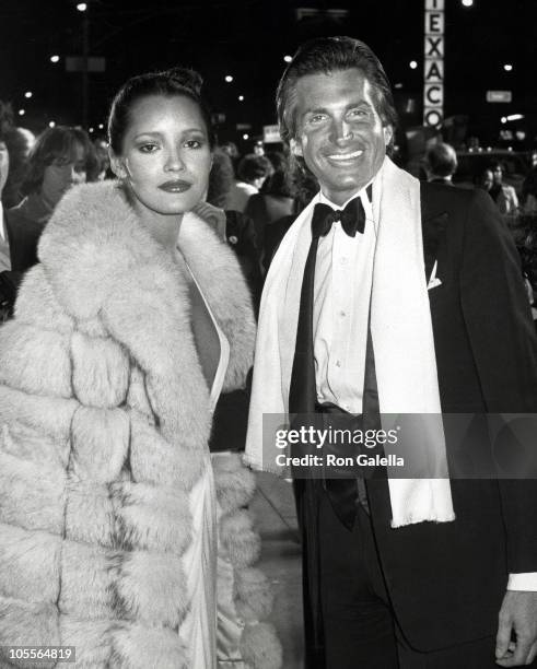 Barbara Carrera and George Hamilton during "Sextette" - New York Premiere at Dome Theater in New York City, New York, United States.