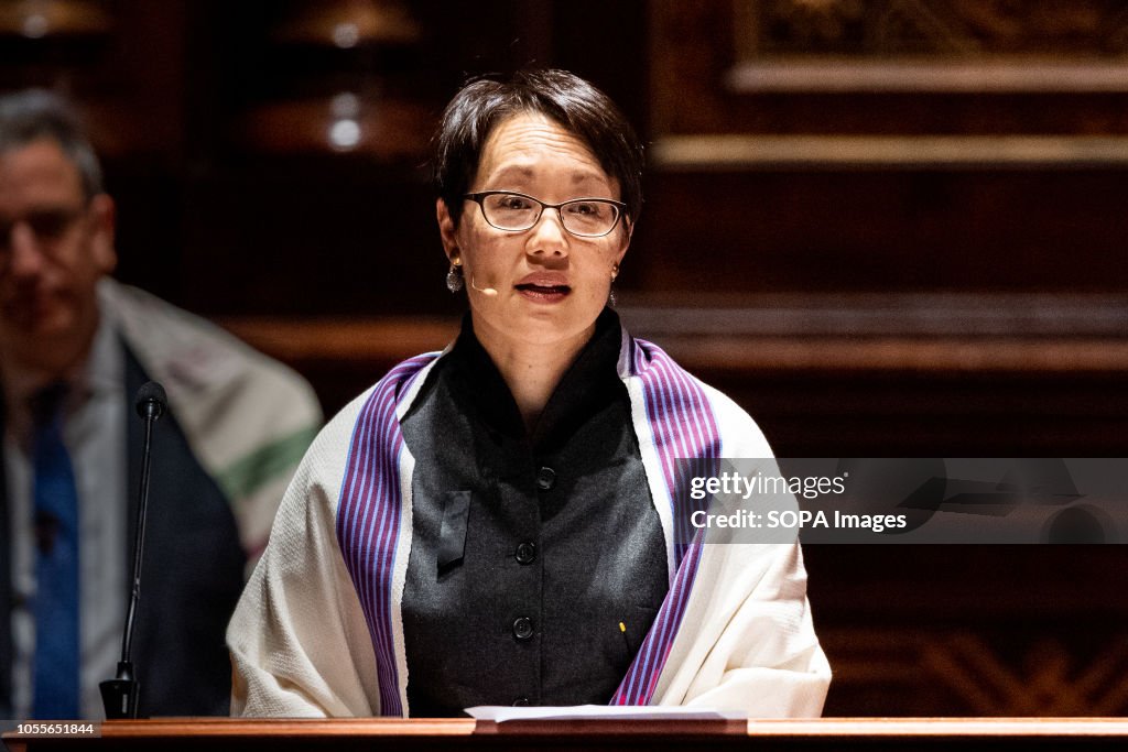 Rabbi Angela Buchdahl speaking at the interfaith prayer...