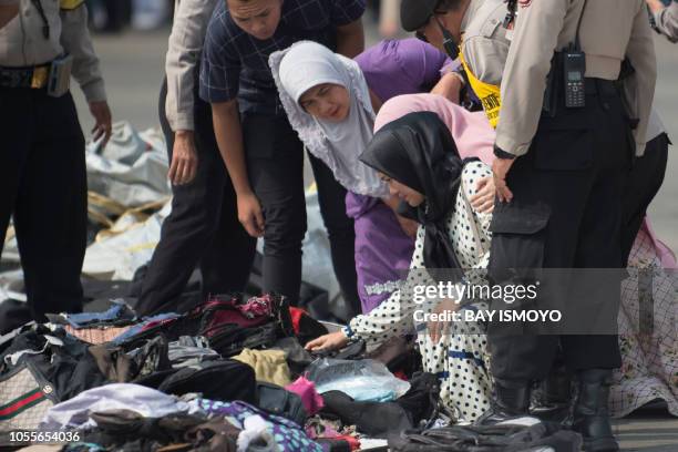 Next of kin attempt to identify personal items of loved ones who were on board the ill-fated Lion Air flight JT 610, at a port in Jakarta on October...