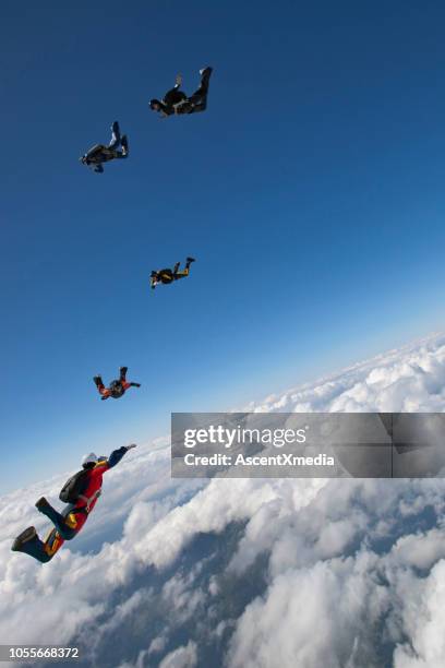 skydivers fall towards the earth - championship day five stock pictures, royalty-free photos & images