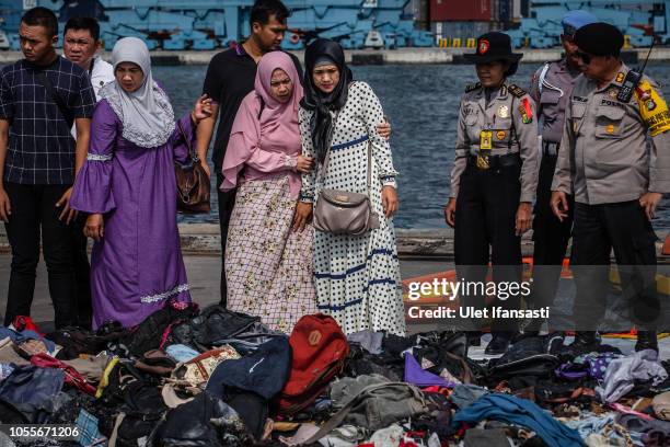 Families of the victims of Lion Air flight JT 610, visit an operations centre to look for personal items of their relatives, at the Tanjung Priok...