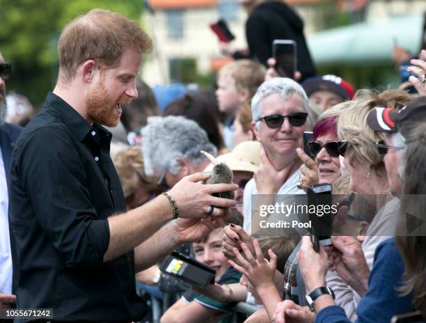Prince Harry, Duke of Sussex greets the crowds during a walkabout at Government Gardens on October 31, 2018 in Rotorua, New Zealand. The Duke and...