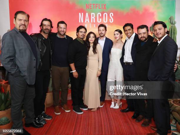 Joaquin Cosio, Jose Maria Yazpik, Eric Newman, Michael Peña, Teresa Ruiz, Diego Luna, Tessa Ia and Tenoch Huerta pose during Netflix Narcos Cocktail...