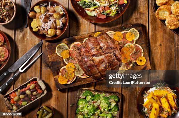 roast beef feast - roast beef dinner stock pictures, royalty-free photos & images