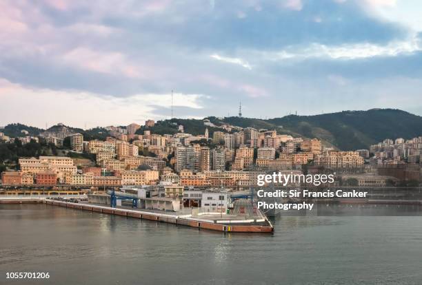 sunrise colors in old port of genoa at early morning in liguria, italy - genova foto e immagini stock