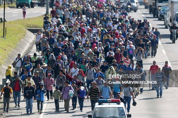 Salvadoran migrants embark on a journey in caravan to the United States, in San Salvador on October 31, 2018. - Many Salvadoreans inspired by the...