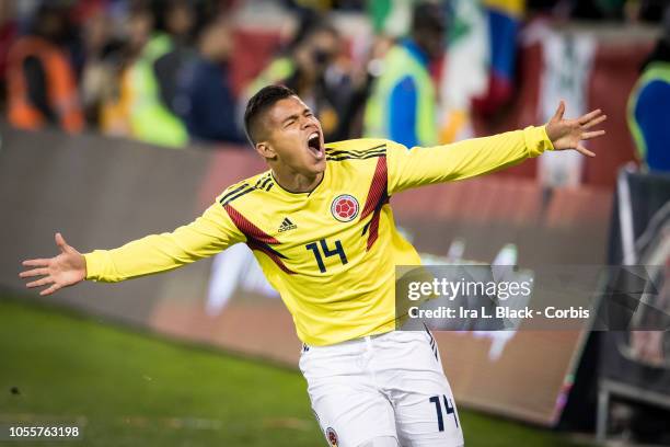 Juan Camilo Hernandez of Colombia with his arms out wide celebrates his goal in the second half of the International Friendly match between Columbia...