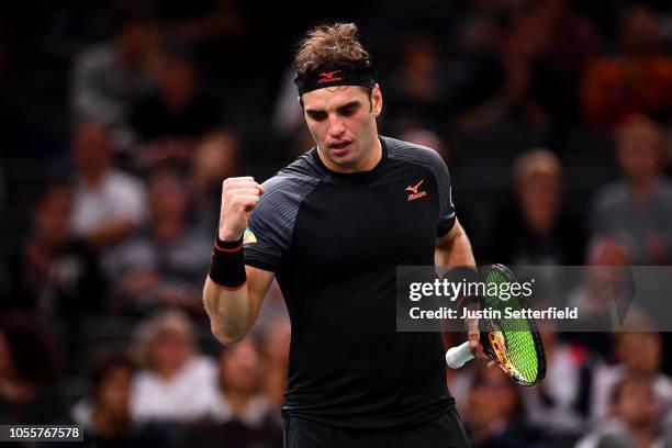 Malek Jaziri of Tunisia celebrates winning a point in his second round match against Fernando Verdasco of Spain during Day 3 of the Rolex Paris...